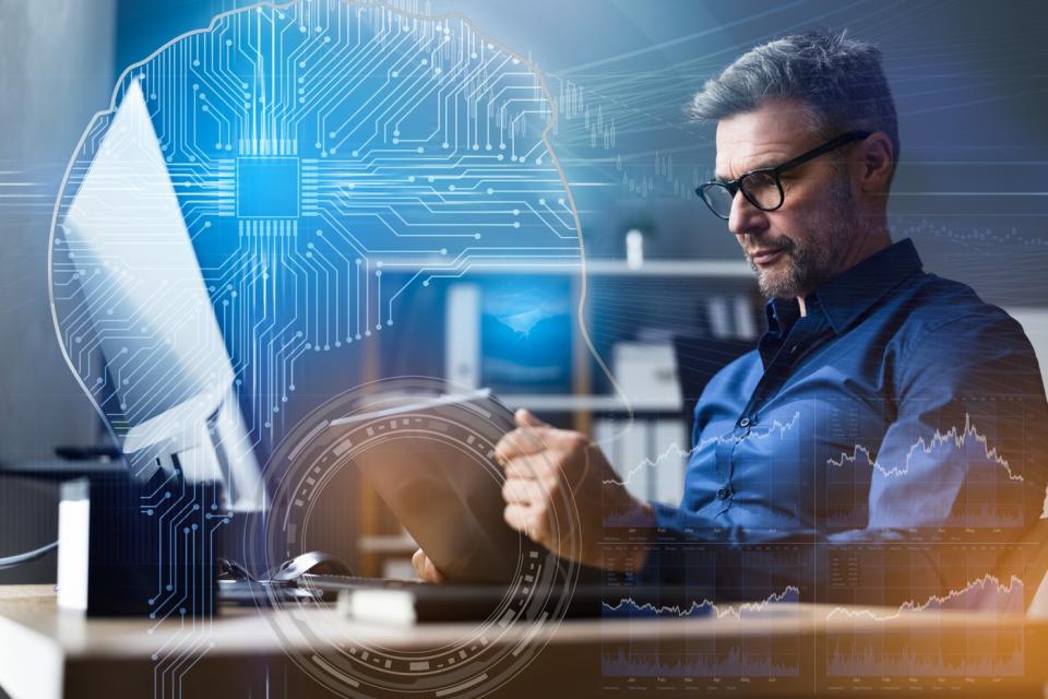 Person investing in technology on computer.